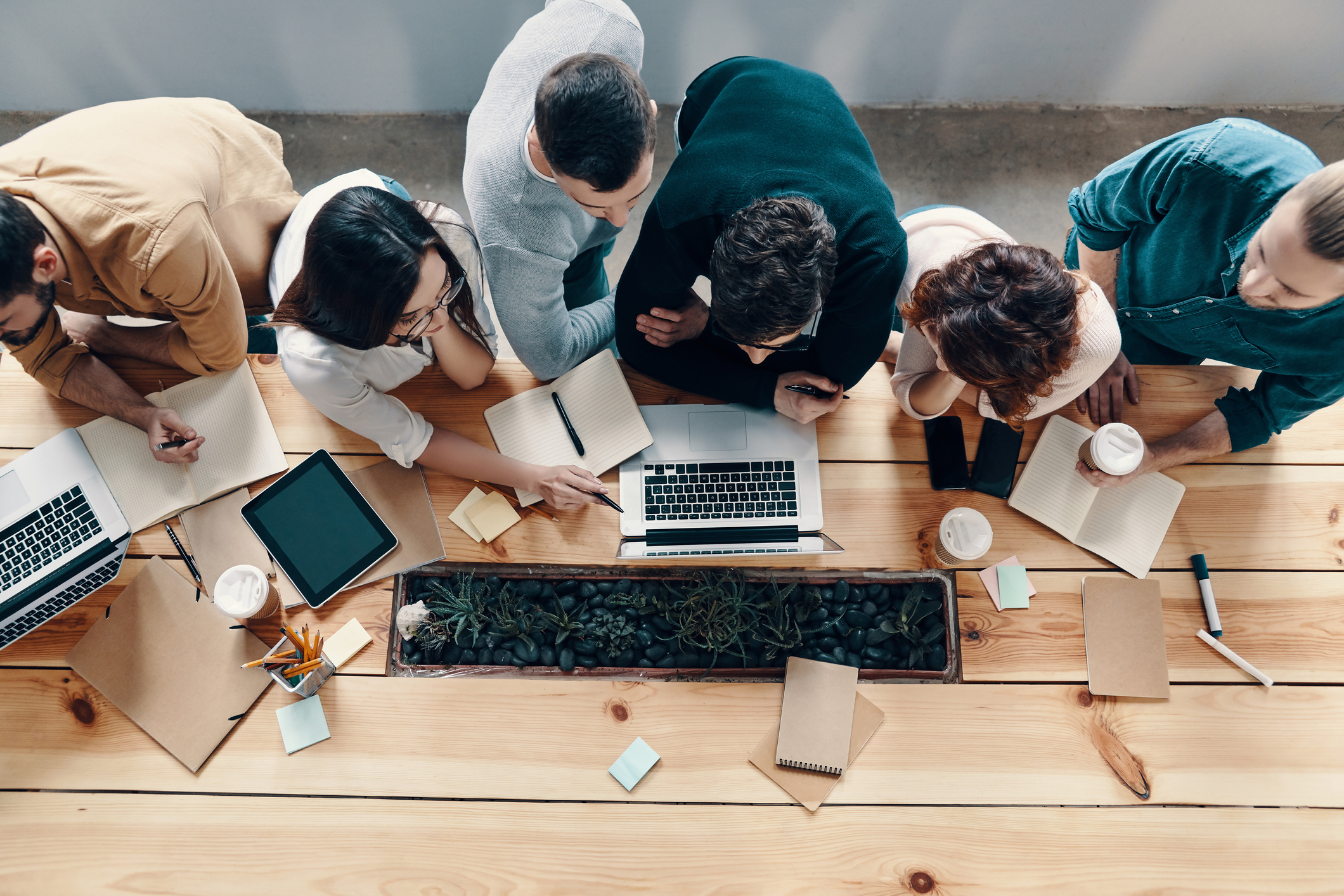 workers looking at a laptop