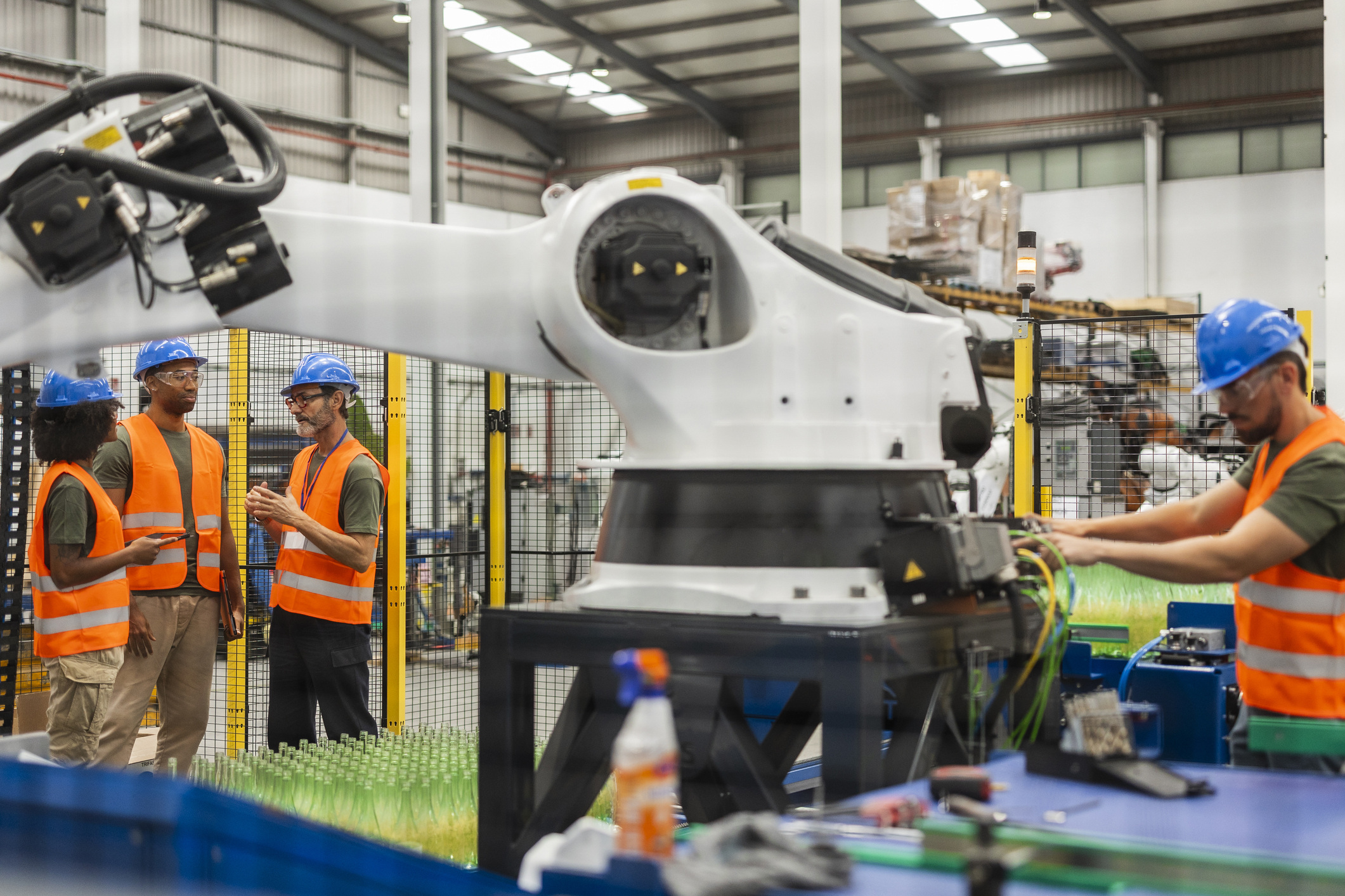 contingent workers with robotics arm